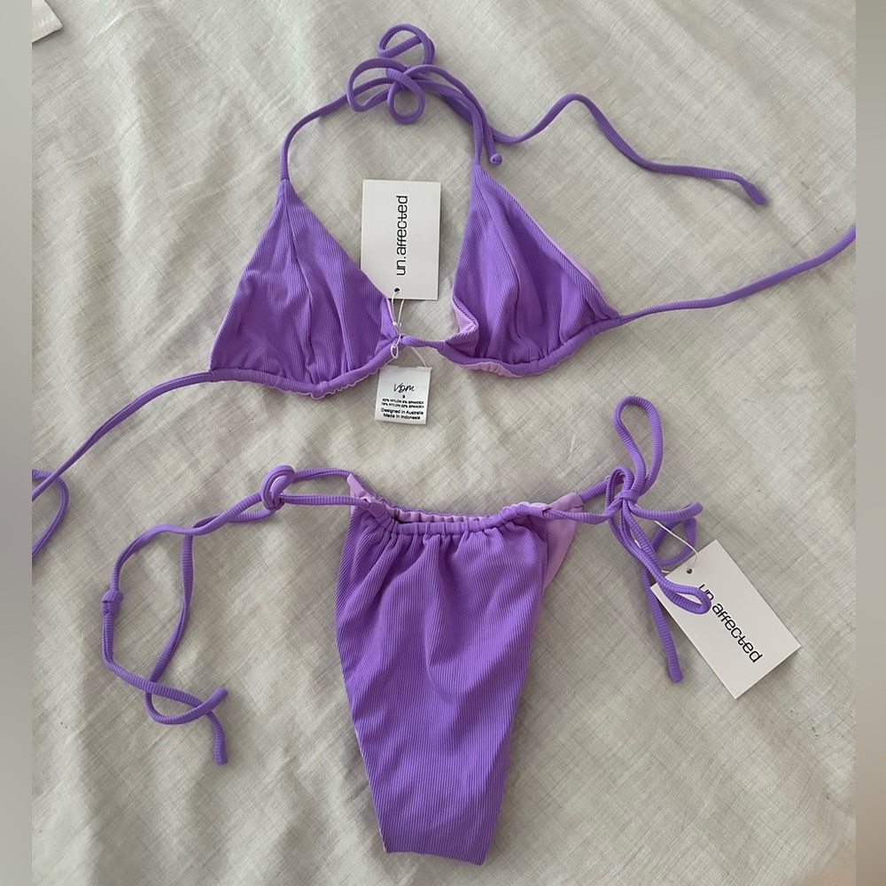 Lilac VDM bikini bottom and top. New with tags never worn!